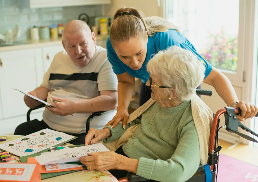 Home health aide assisting elderly patients with an activity in a home setting
