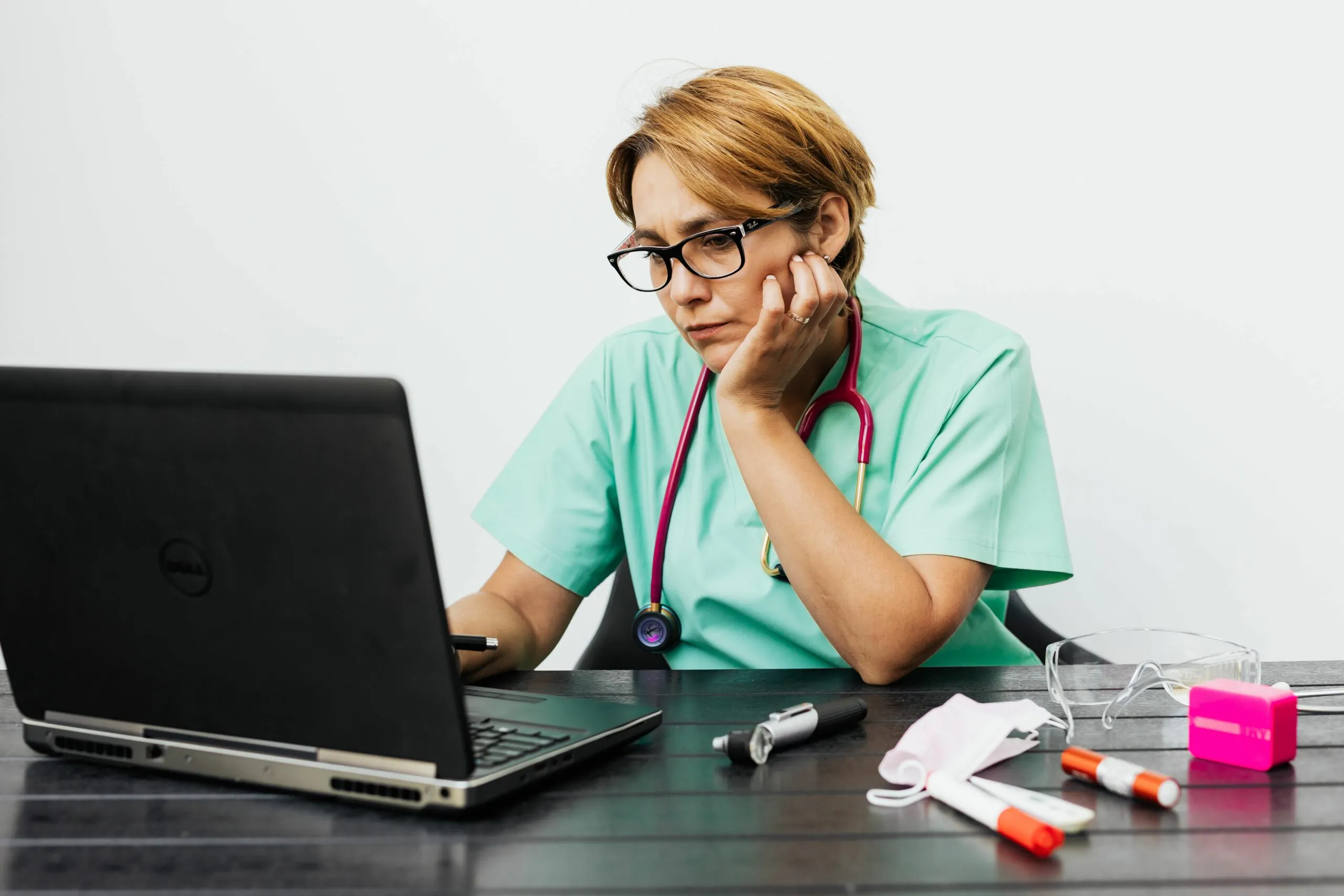 Applicant submitting letters of recommendation through the ERAS portal on a laptop