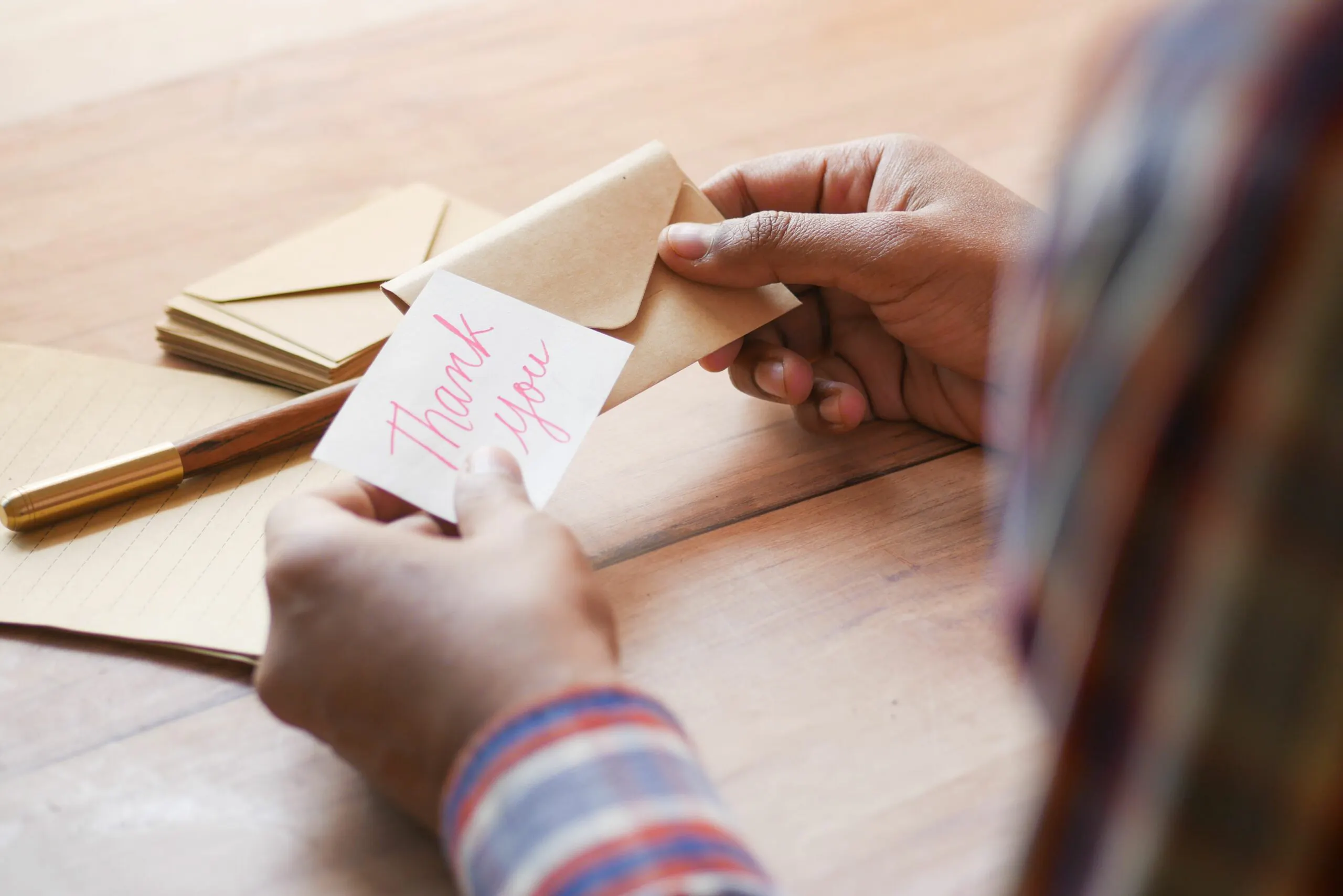 Medical student writing a thank-you note to a residency letter of recommendation writer