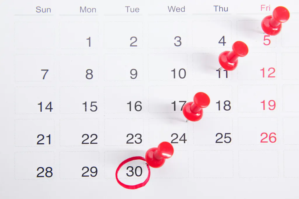 Desk calendar with October 30 circled in red, marking when the ANCC FNP exam changes take effect in 2026